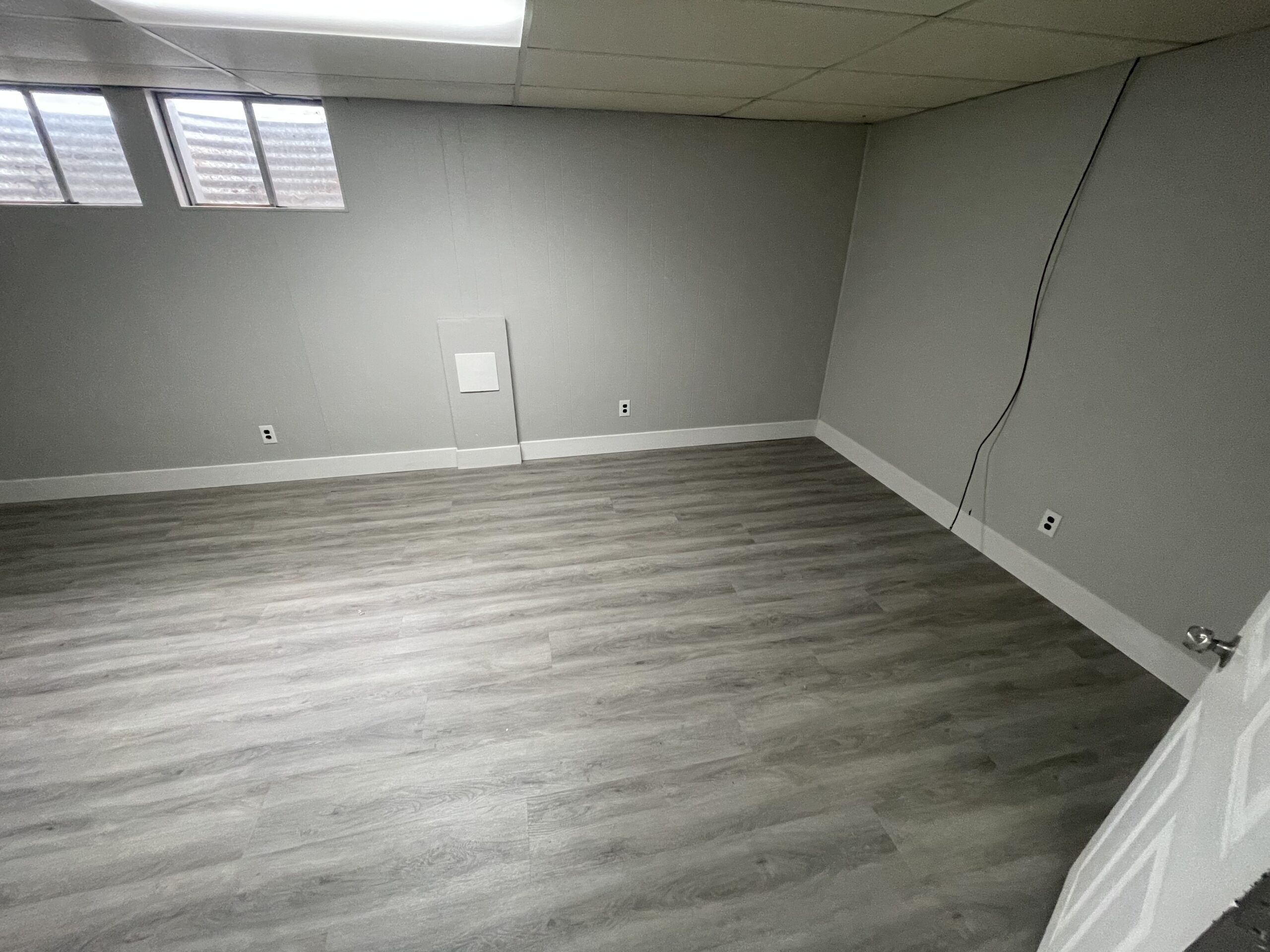 Installing Luxury Vinyl Plank Over Concrete Basement Floors in Denver