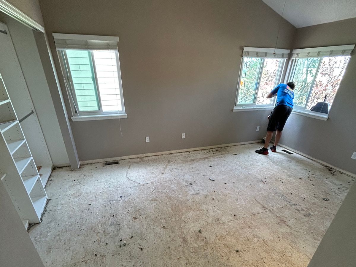 Installing vinyl flooring throughout a full home in Denver