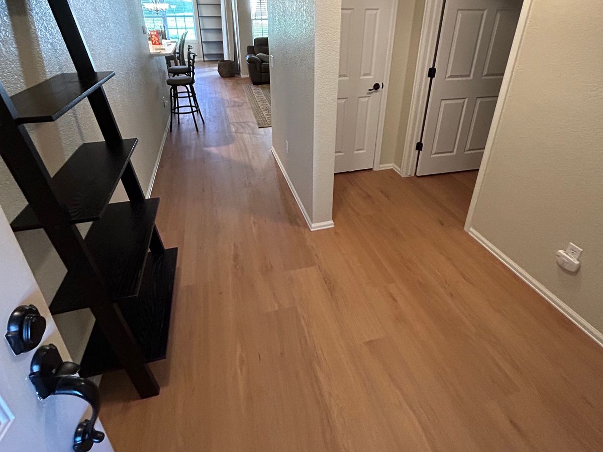 Vinyl flooring installation in a Denver home with luxury vinyl planks laid over a prepped subfloor